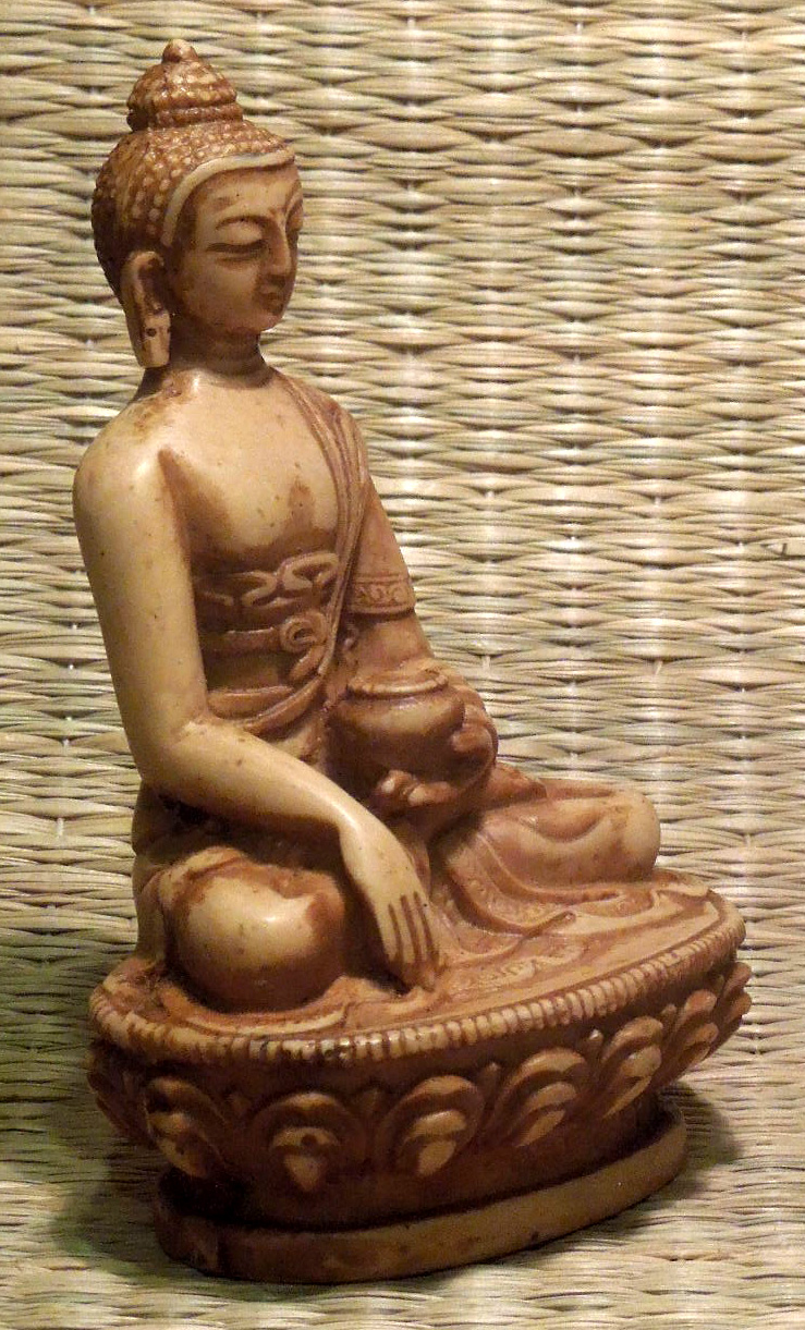 Buddha s gestem probuzení